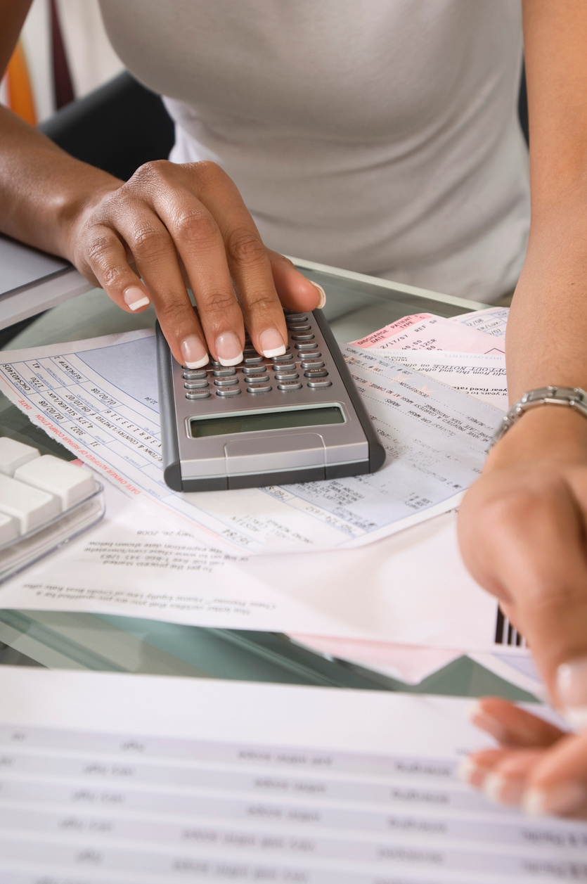 Woman calculating bills